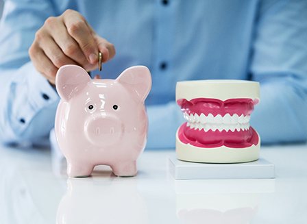 Patient in Parma dropping coins in a piggy bank