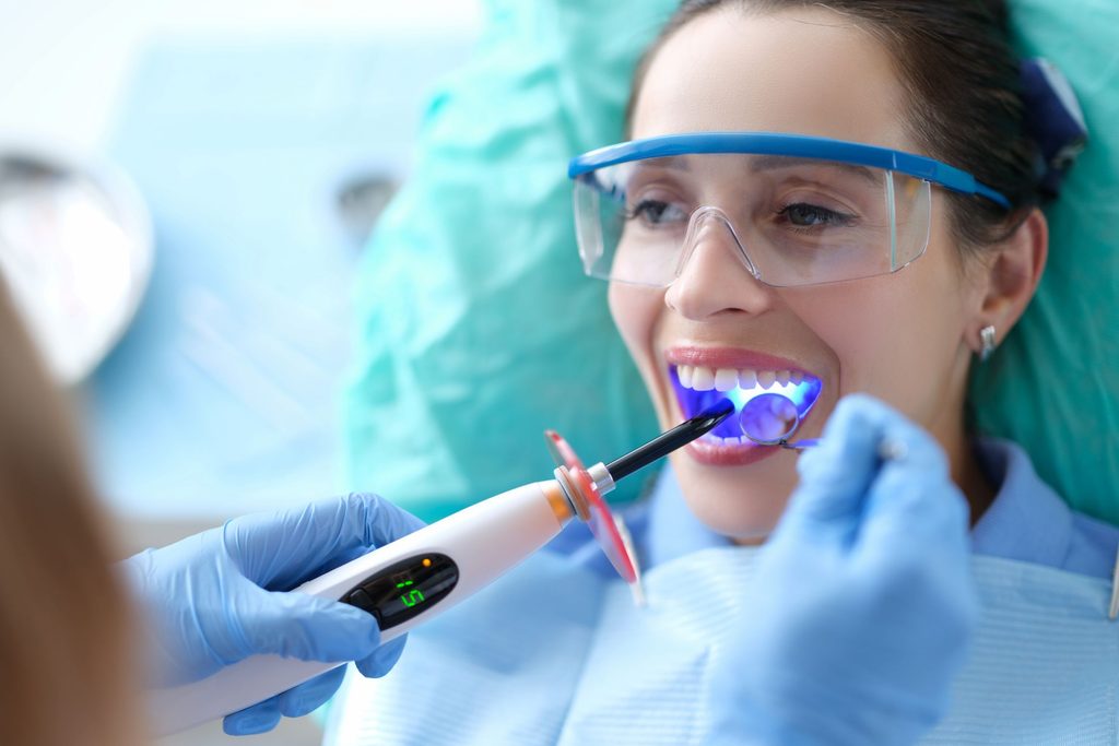 A woman getting cosmetic bonding